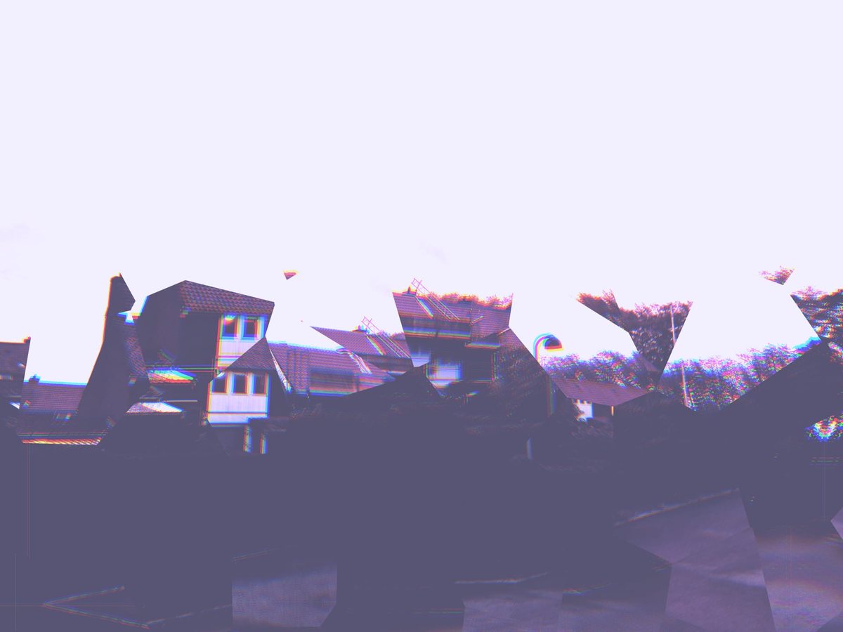 The same street shattered into shards under a white sky